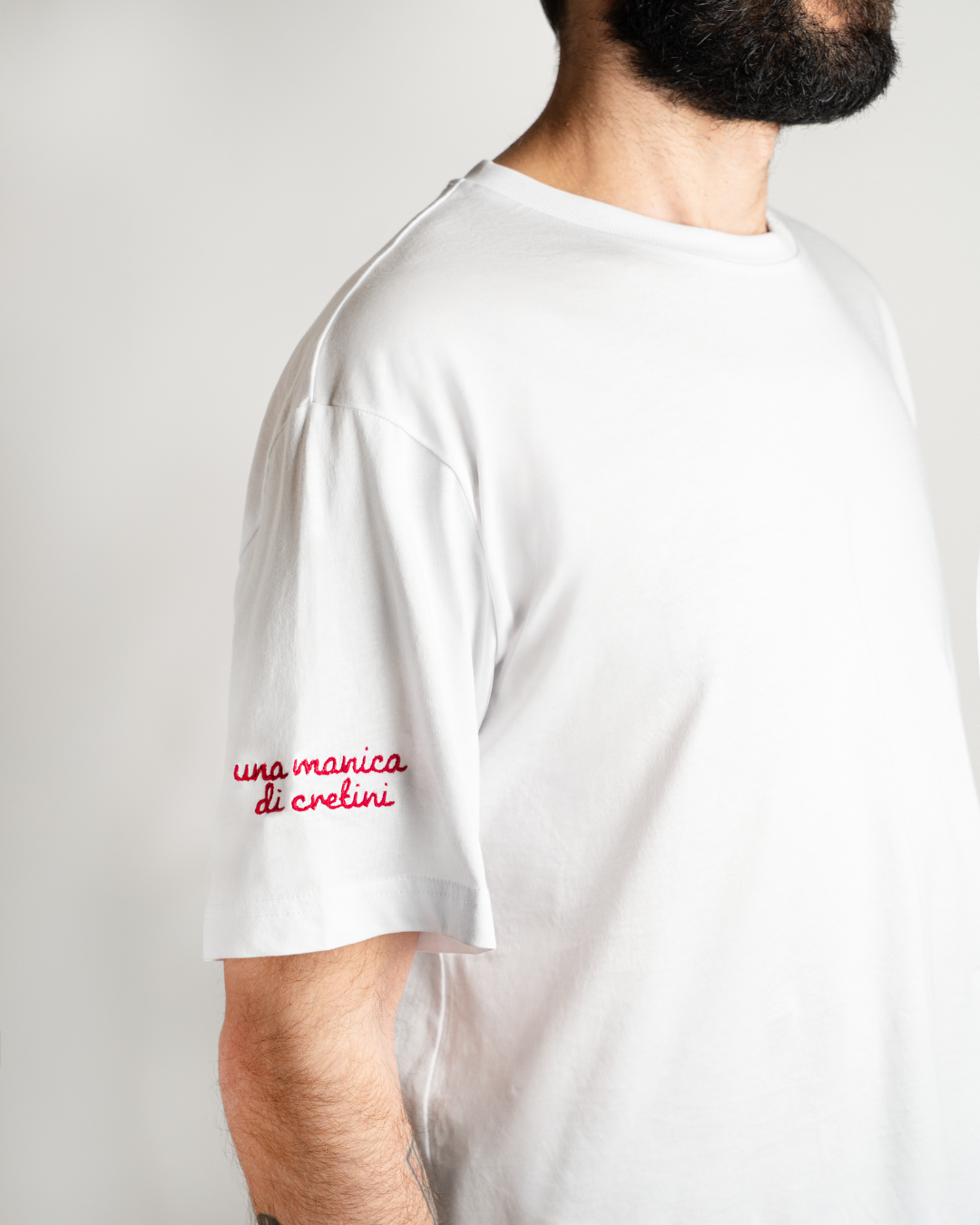 T-shirt una manica di cretini